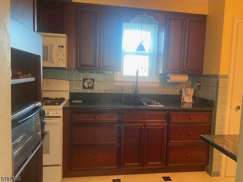 4. Single Family for Sale at Clifton, NJ 07012